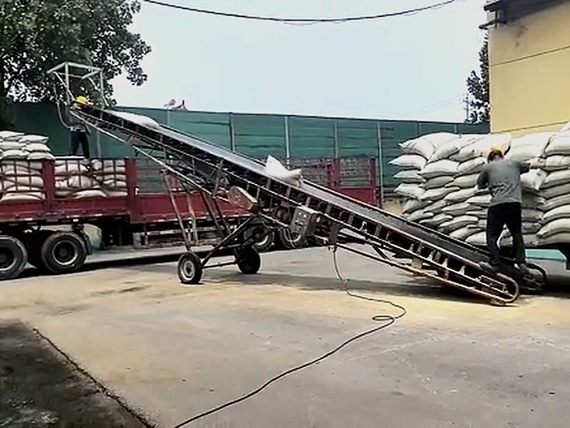 Packing line filling woven bags with white granules